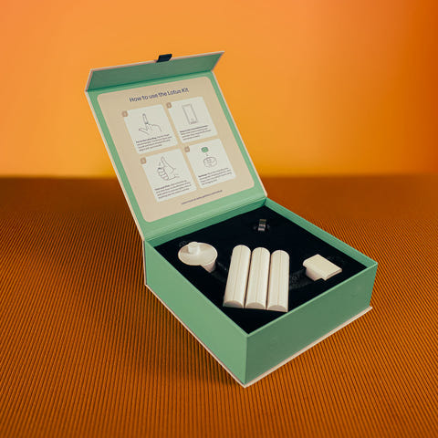 Open Lotus kit box showing all components and instructions